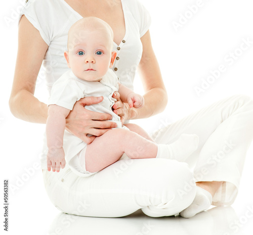 Photo: Young mother hugging baby Young mother hugging baby