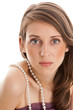 Woman wearing pearl necklace