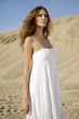 Photo: attractive and sensuality woman dancing in the desert attractive and sensuality woman dancing in the desert