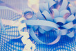 present wrapping: blue ribbon on dotted paper