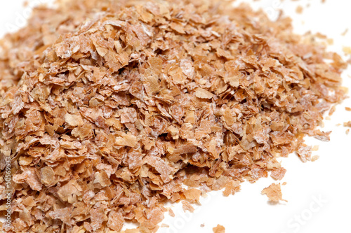 Photo: wheat bran isolated on white background wheat bran isolated on white background