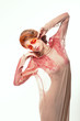 Glamour. Beautiful Woman with Bright Ruby Makeup. Creativity