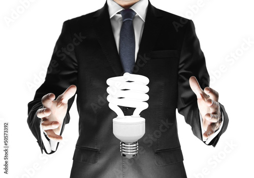 Photo: businessman with lamp businessman with lamp