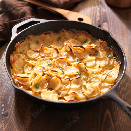 Photo: scalloped potatoes in rustic iron skillet scalloped potatoes in rustic iron skillet