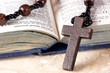 Rosary beads, cross and Bible