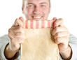 Man holding paper bag