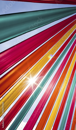 Photo: Sun flare through coloured ribbons Sun flare through coloured ribbons