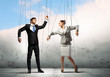 Puppet businesspeople