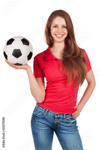 Photo: Girl in jeans with soccer Ball Girl in jeans with soccer Ball