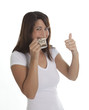 Foto: Woman enjoys a cup of espresso Woman enjoys a cup of espresso