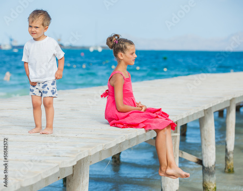 Photo: Kids walking on jetty Kids walking on jetty