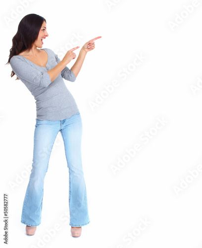 Photo: Happy woman showing a copyspace. Happy woman showing a copyspace.