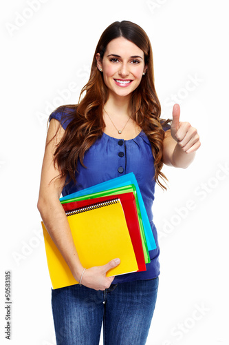 Photo: Young woman student with a book. Young woman student with a book.