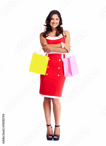 Photo: Beautiful woman with a shopping bags. Beautiful woman with a shopping bags.