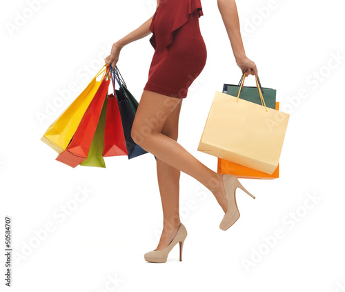 Photo: long legs with shopping bags long legs with shopping bags