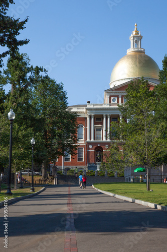 Photo: Freedom trail red line crossing common park in Boston Freedom trail red line crossing common park in Boston