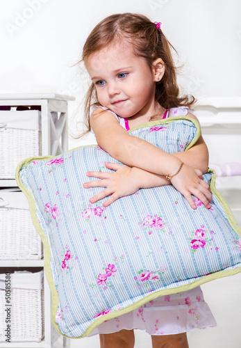 Photo: Toddler girl with pillow Toddler girl with pillow