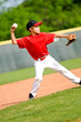 Youth ball player throwing ball