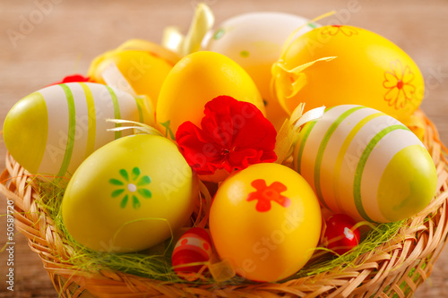 Photo: Easter eggs in a wicker basket Easter eggs in a wicker basket