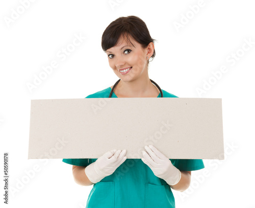 Photo: lady doctor keeping empty poster lady doctor keeping empty poster