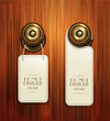 Vector hotel handles with hanging signs on the wooden background
