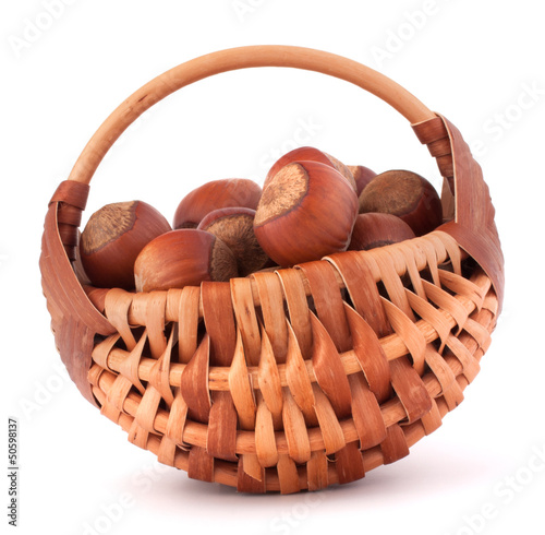 Photo: Hazelnuts in wicker basket Hazelnuts in wicker basket