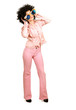 Young woman wearing afro wig and big glasses