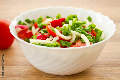 Photo: fresh salad of radish and tomatoes fresh salad of radish and tomatoes