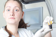 Woman loading samples in biochemical analyzer