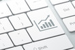 Marketing concept: Growth Graph on computer keyboard background