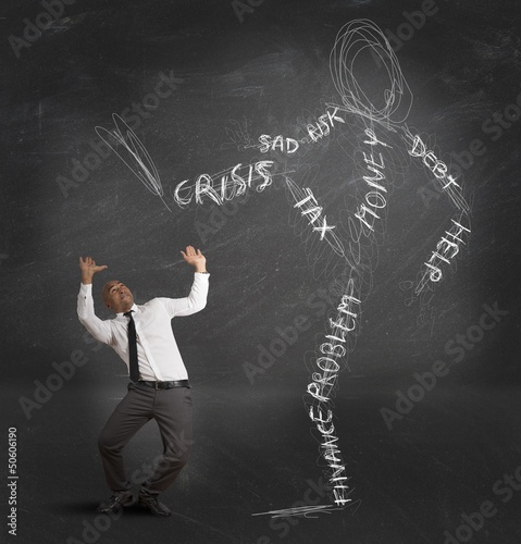 Photo: Businessman oppressed by the crisis Businessman oppressed by the crisis