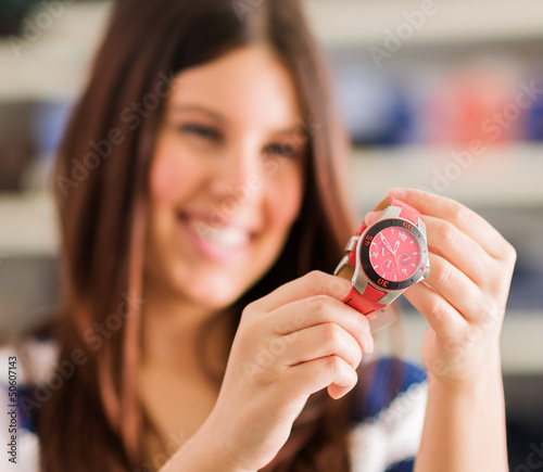 Photo: Happy Woman Buying New Wristwatch Happy Woman Buying New Wristwatch