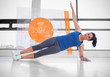 Photo: Attractive woman doing yoga with futuristic interface next to he Attractive woman doing yoga with futuristic interface next to he