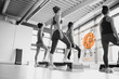 Rear view of women doing exercise with futuristic interface
