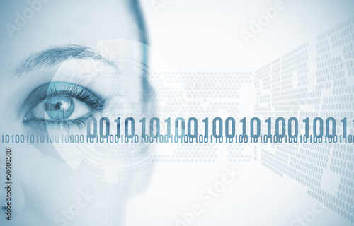 Photo: Close-up of eye of woman with futuristic background Close-up of eye of woman with futuristic background