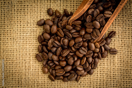 Photo: Wooden shovel with coffee beans Wooden shovel with coffee beans