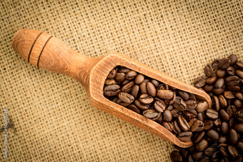 Photo: Wooden shovel full of coffee beans Wooden shovel full of coffee beans