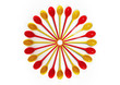 red and yellow plastic spoons