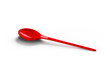 red plastic spoon
