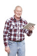 Senior man using tablet computer smiling