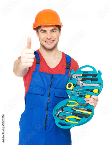 Photo: handyman with tools showing thumbs up sign handyman with tools showing thumbs up sign