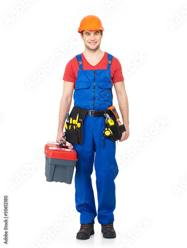 Photo: Handyman with tools full portrait isolated Handyman with tools full portrait isolated