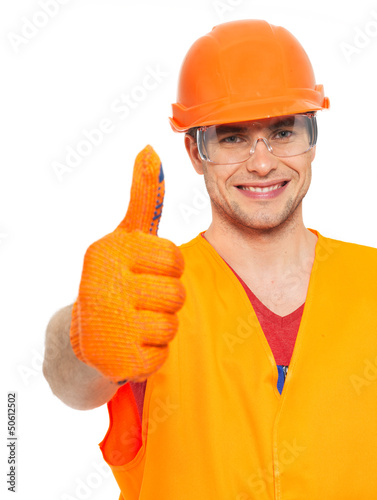 Photo: Portrait of craftsman with thumbs up sign Portrait of craftsman with thumbs up sign