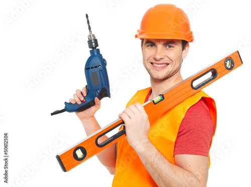 Photo: Portrait of manual worker with tools Portrait of manual worker with tools