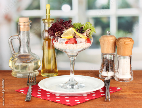 Photo: Delicatessen seafood salad with rice in glass Delicatessen seafood salad with rice in glass