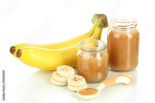 Photo: Baby puree with bananas isolated on white Baby puree with bananas isolated on white