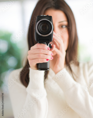 Photo: Portrait Of Woman Using Camcorder Portrait Of Woman Using Camcorder