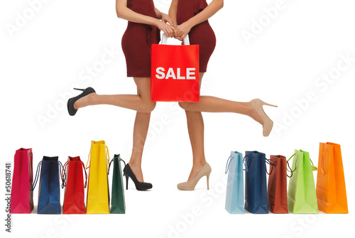 Photo: long legs with shopping bags long legs with shopping bags