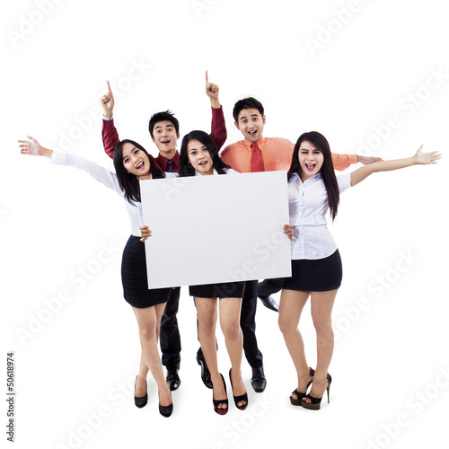 Photo: Success business team on white Success business team on white