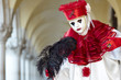 Venetian costume attends Carnival of Venice.